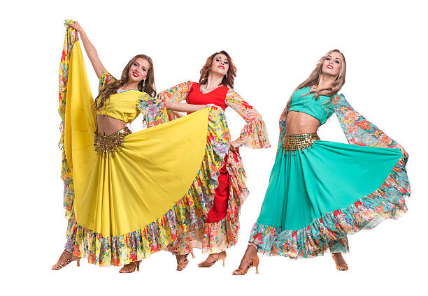 istock three female dancers posing, isolated on white in full length 506896982