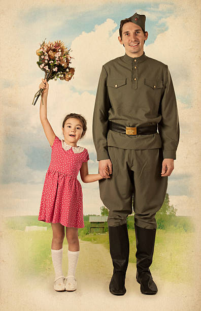 istock Little girl meets a soldier 506897168