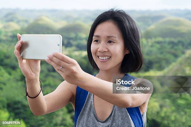 Woman Taking A Selfie Stock Photo - Download Image Now - Philippines, Using Phone, Mobile Phone