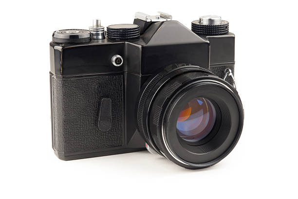 istock Old vintage camera isolated on white background 506898446