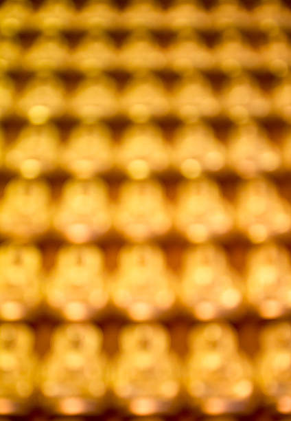 abstract blur focus image buddha on wall stock photo