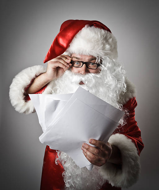 istock Santa Claus and letters 506899512