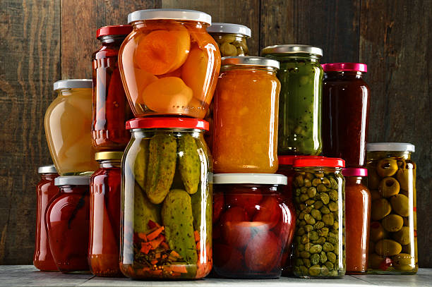 istock Jars with pickled vegetables, fruity compotes and jams 506900078