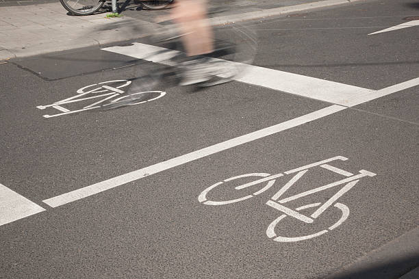 istock Bike Lane and Cyclist, Cologne 506900276