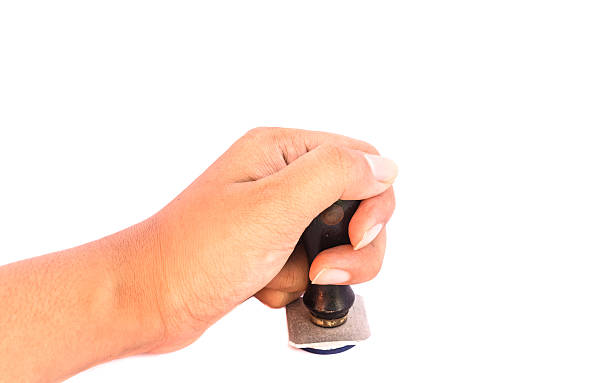istock Hand with rubber stamps isolated on White Background 506900484