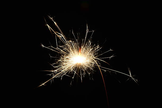 istock art of sparkler on black background 506902258