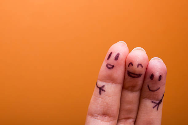 three smiling fingers that are very happy to be friends three smiling fingers that are very happy to be friends, family concept anthropomorphic smiley face photos stock pictures, royalty-free photos & images