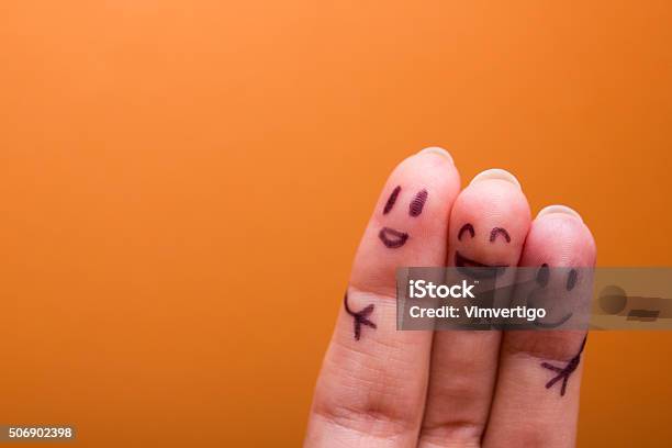 Three Smiling Fingers That Are Very Happy To Be Friends Stock Photo - Download Image Now