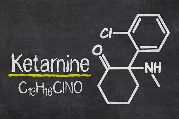 Blackboard with the chemical formula of Ketamine Blackboard with the chemical formula of Ketamine chemical formula photos stock pictures, royalty-free photos & images