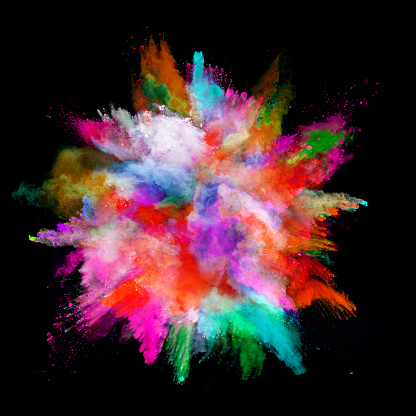 ✓ Colored powder explosion on black background. Stock Photos