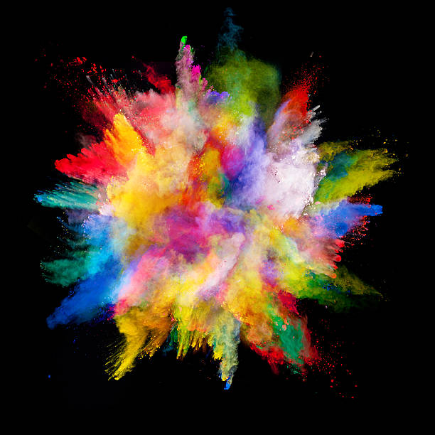 istock Explosion of colored powder on black background 506905664