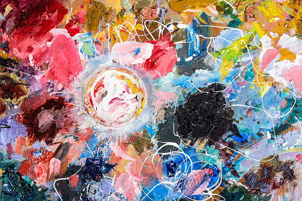 istock The artist palette with a Cup for mixing paints 506906266