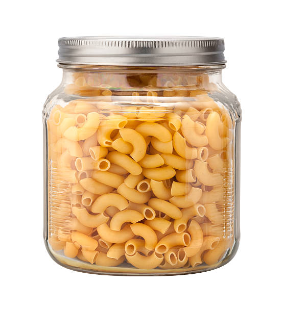 istock Elbow Macaroni Pasta in a Glass Jar 506908584