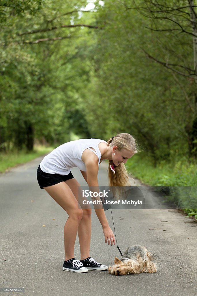 My beloved pet Beautiful girl with her beloved pet for a walk. 20-29 Years Stock Photo