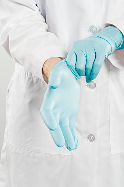 istock Nurse Wearing Sterilized Hand Glove 506909347