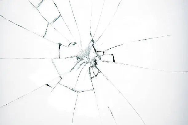 Photo of Broken glass on white background