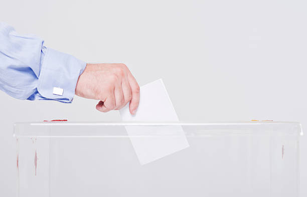 istock Close up of man hands voting 506909991