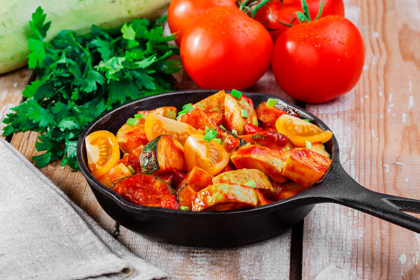 istock roasted squash and zucchini in tomato sauce 506910039