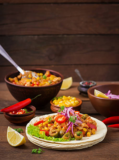 istock Mexican tacos with meat, corn and olives 506910076