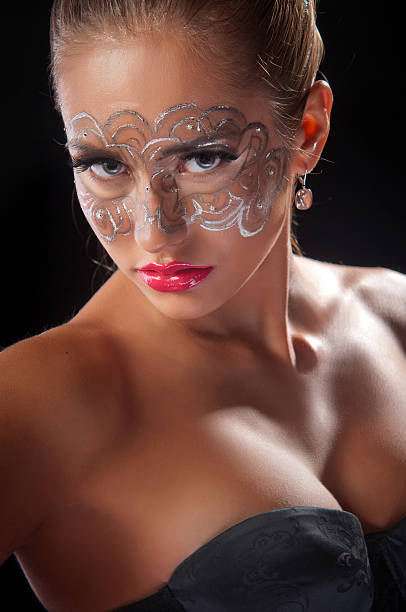 istock young woman with lace makeup 506911614