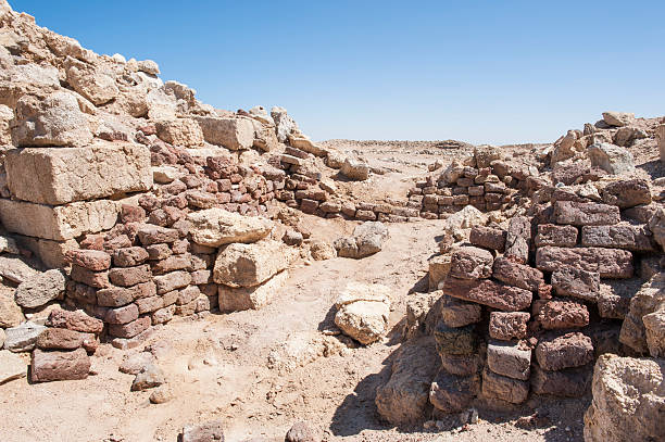 istock Old roman ruins on desert coastline 506912015