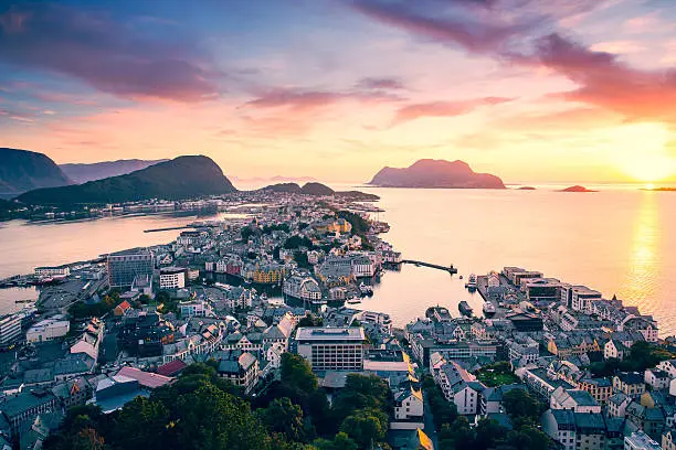 Top view of the city of Alesund at sunset . Norway