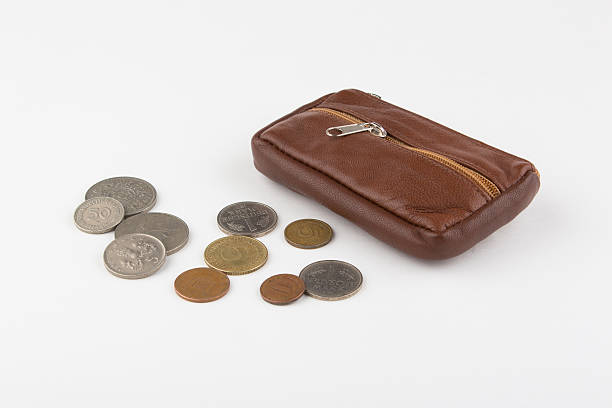 istock purse and old coins 506912670