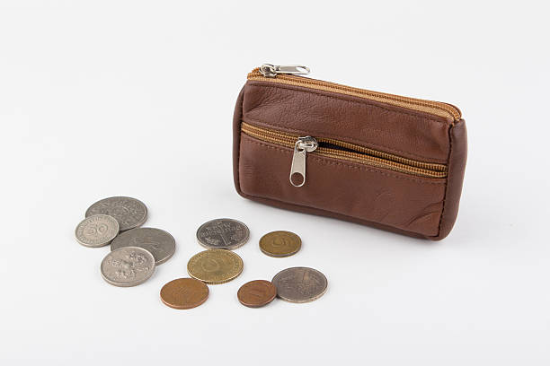 istock purse and old coins 506912984