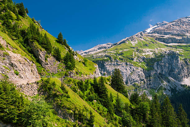 Kalusen pass mountain road in Swiss Alps stock photo