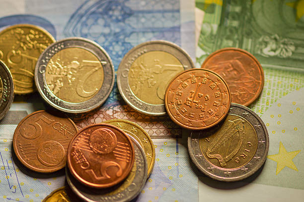 istock Euro coins and banknotes money. 506913847