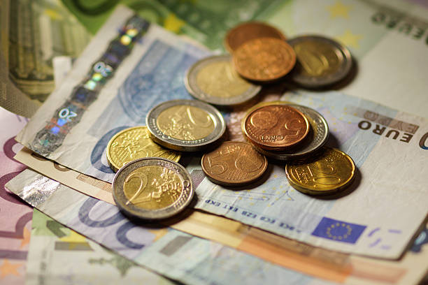 istock Euro coins and banknotes money. 506913901