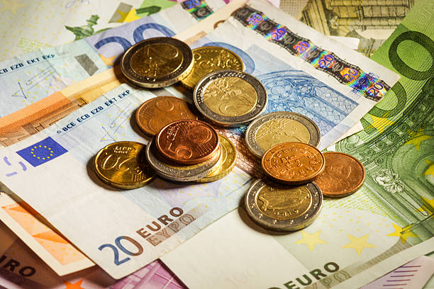 istock Euro coins and banknotes money. 506913941