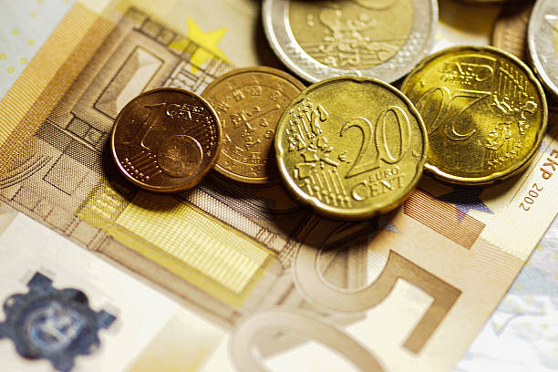 istock Euro coins and banknotes money. 506914033