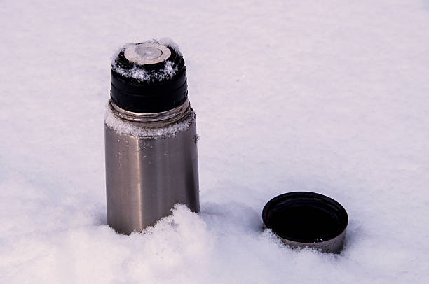 istock camping cup in winter in snow 506914174