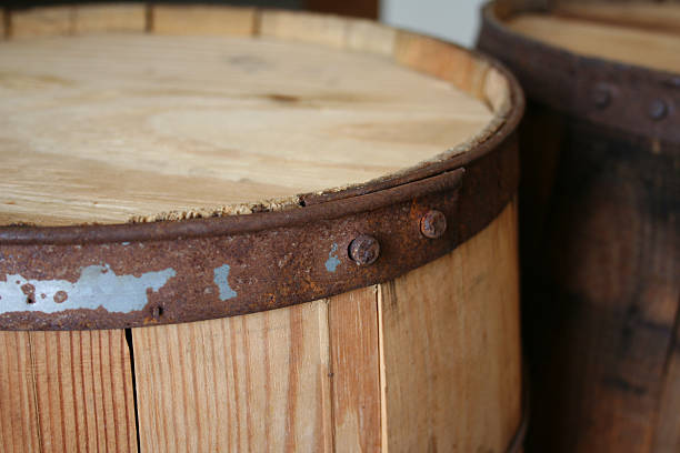 istock Two Old Pine and Oak Wooden Barrels Tops 506915874