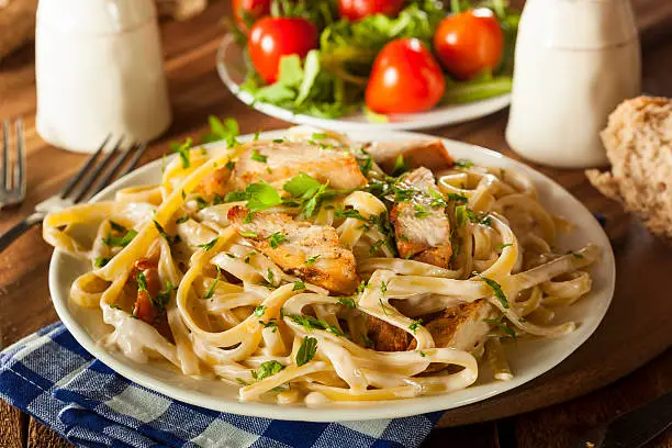 Homemade Fettucini Aflredo Pasta with Chicken and Parsley