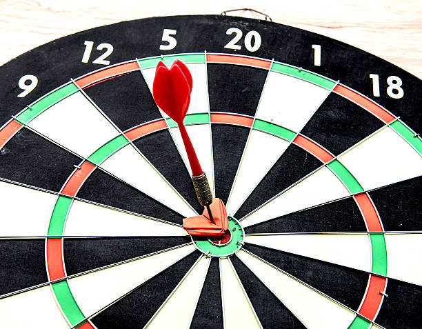 istock darts arrows in the target center with heart 506918120