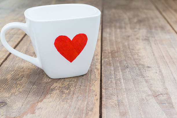 istock Cup of love  on wood table 506919746