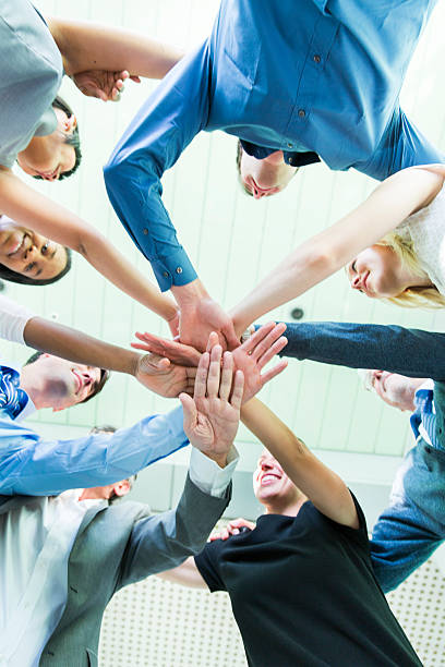istock Working together.... hands of business team showing unity 506921492