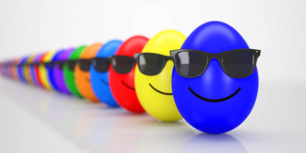 Group of colorful Easter Eggs with Sunglasses in a Row stock photo