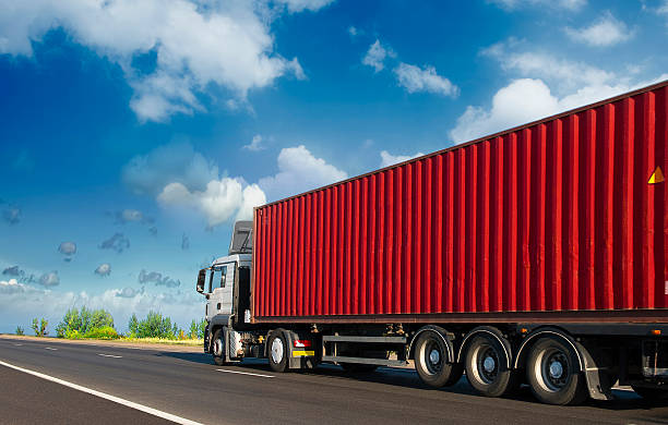 istock Container on the big highway. transport loads 506923792