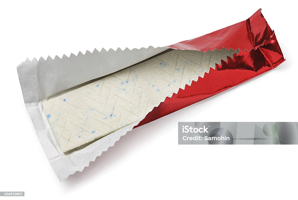 Chewing gum plate in red foil on white Chewing gum plate wrapped in red foil isolated on white with clipping path Bubble Gum Stock Photo