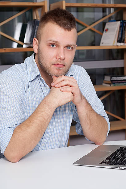 istock Hipster businessman working at his desk office 506924568