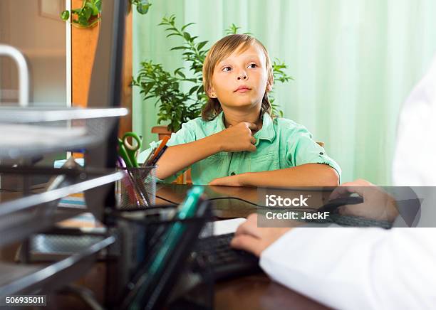 Doctor With Teenager Patient Stock Photo - Download Image Now - 10-11 Years, Boys, Child