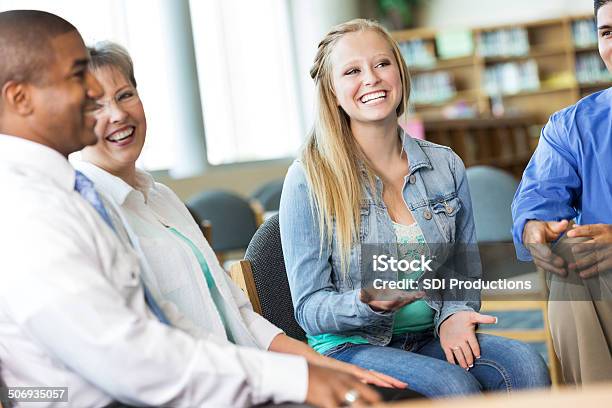 Teenager Talking To Diverse Group In Support Therapy Meeting Stock Photo - Download Image Now