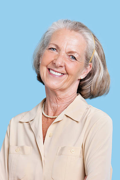 istock Senior woman studio portrait 506975247