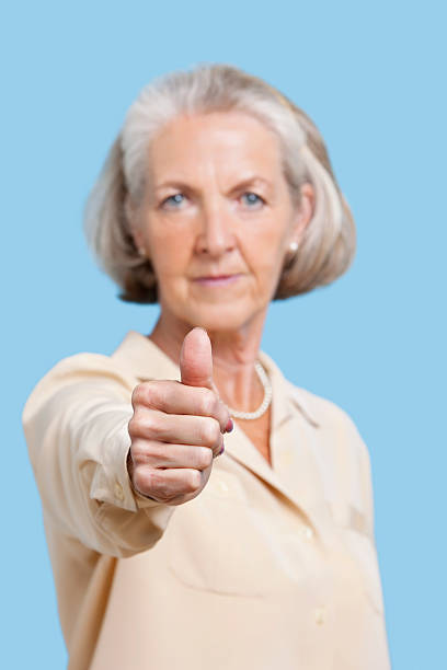 istock Senior woman studio portrait 506975315