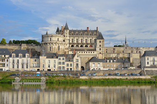 Amboise, France - July 26, 2014: The Amboise Castle on the Loire river in France. It has been recognized as a historical monument by the French Ministry of Culture since 1840. It is also one of the World Heritage Sites.