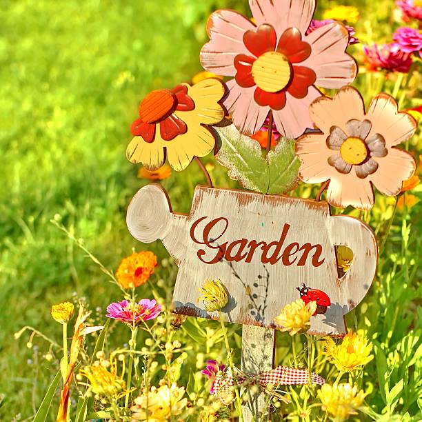 istock Garden sign, message on a wooden watering can 506976331
