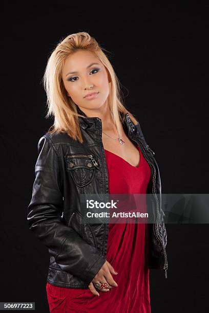 Blond Woman In Red Dress And Leather Jacket Stock Photo - Image - Adult, Beautiful People, Beautiful Woman - iStock
